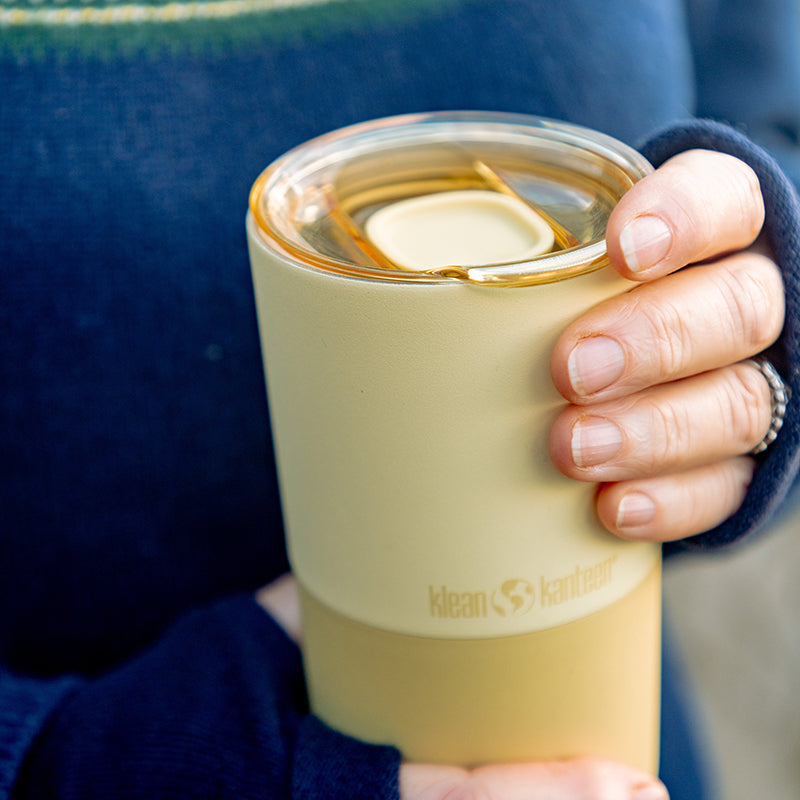 daily-on-the-go-set-l0 16oz_rise_tumbler_wax_yellow_closeup_hand_lid_square.jpg