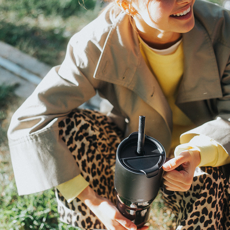 26oz-rise-tumbler-with-straw-lid-g7 26oz_rise_tumbler_black_woman_topview_square.jpg