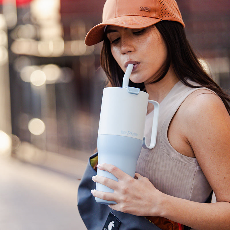 36oz-rise-tumbler-with-straw-lid-o5 36oz_rise_tumbler_straw_girl_sip_square.jpg