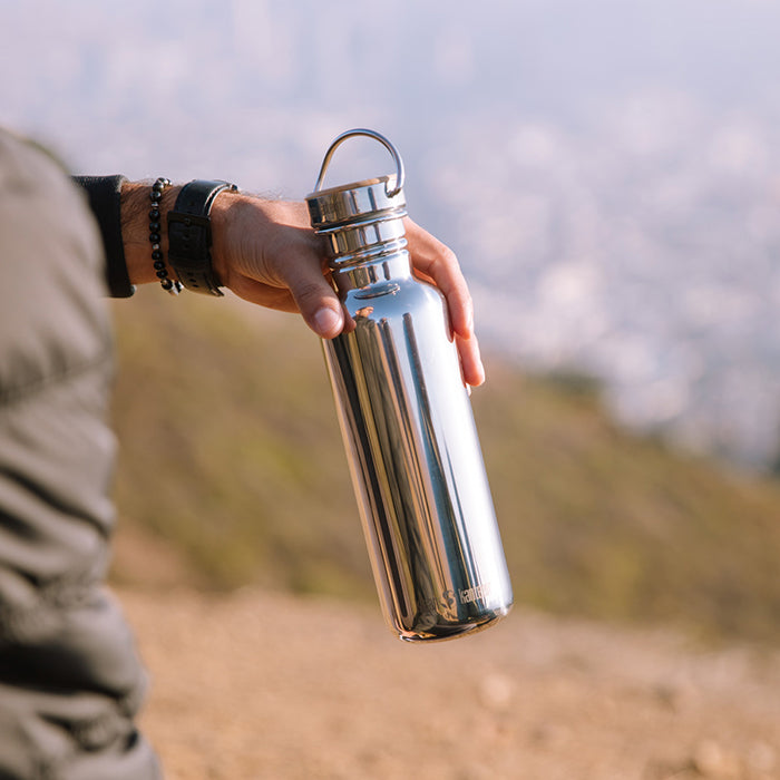 27oz-reflect-with-bamboo-cap-x2 K27SSLRF-MS-BAMBOO_reflect_bottle_hand_lifestyle.jpg