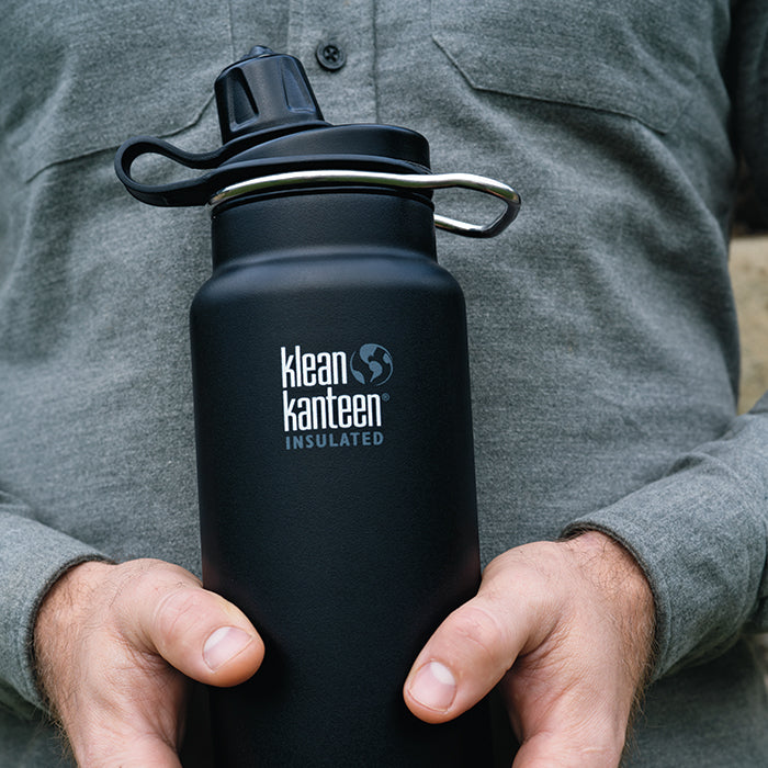 tkwide-chug-cap-m0 K32TKWSSL-SB-Craddled-Bottle_closeup_lifestyle.jpg