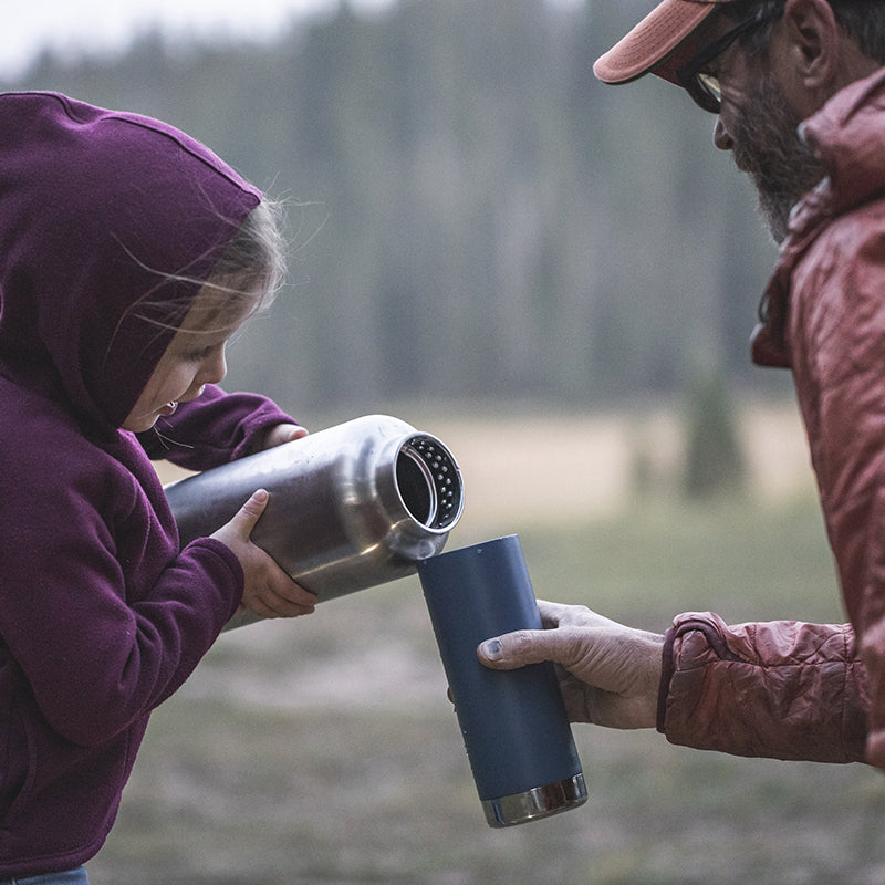 64oz-tkwide-with-loop-cap-k2 tkwide_64oz_bottle_girl_dad_filling_square.jpg